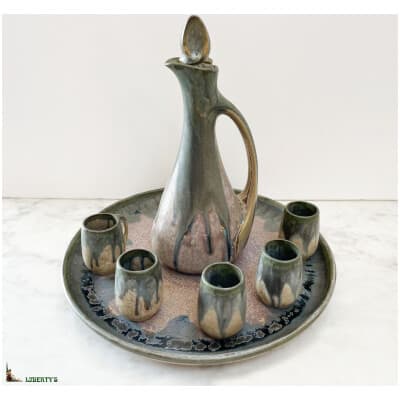 Sandstone liqueur service, tray + pitcher + 5 cups, signed Denbac, high. pitcher 21 cm (Deb. XXth)