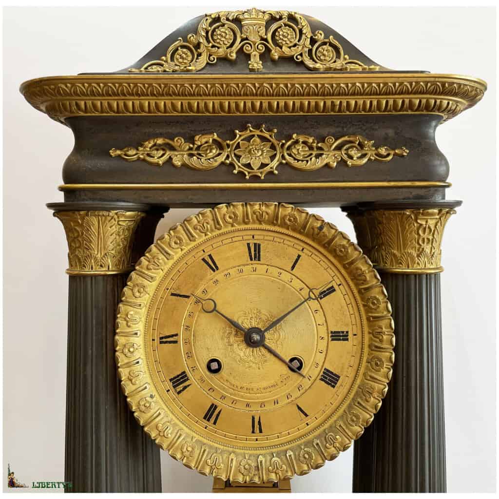 Portico regulator in bronze gilded with mercury and patinated, compensated balance, movement with date, signed Monroux rue St Honoré Paris, top. 63 cm, Fine XIXand 4
