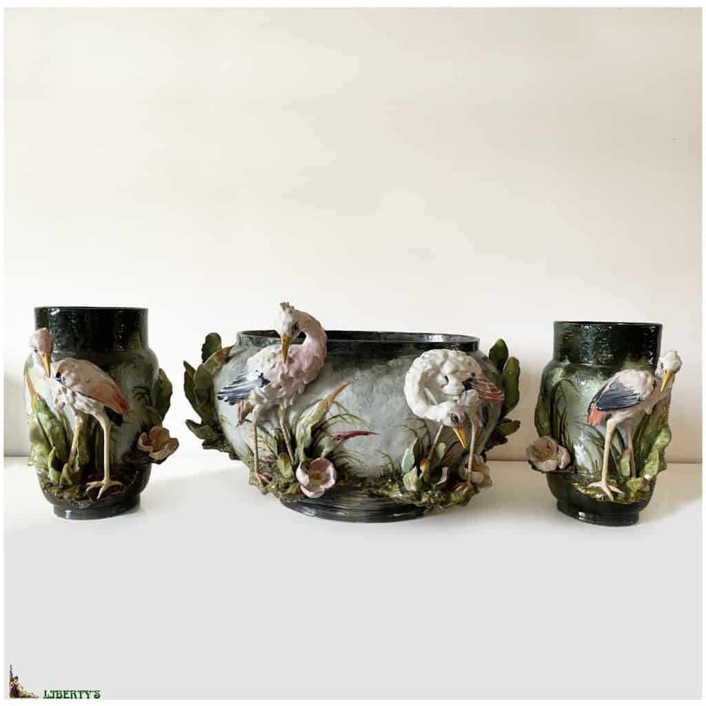 Barbotine garnish from Montigny sur Loing decorated with storks, planter 51 cm x 45 cm x high 31 cm and pair of high vases. 29 cm 3