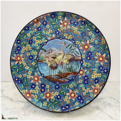 Dish with Emaux de Longwy cartel, decor of herons, diam. 36 cm (1930-1940)