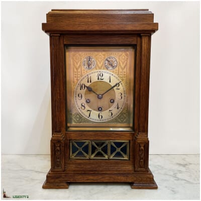 Wood clock with Westminster sound striking at the half and quarter hours, from Junghans, high. 41.5 cm, (Deb XXth)