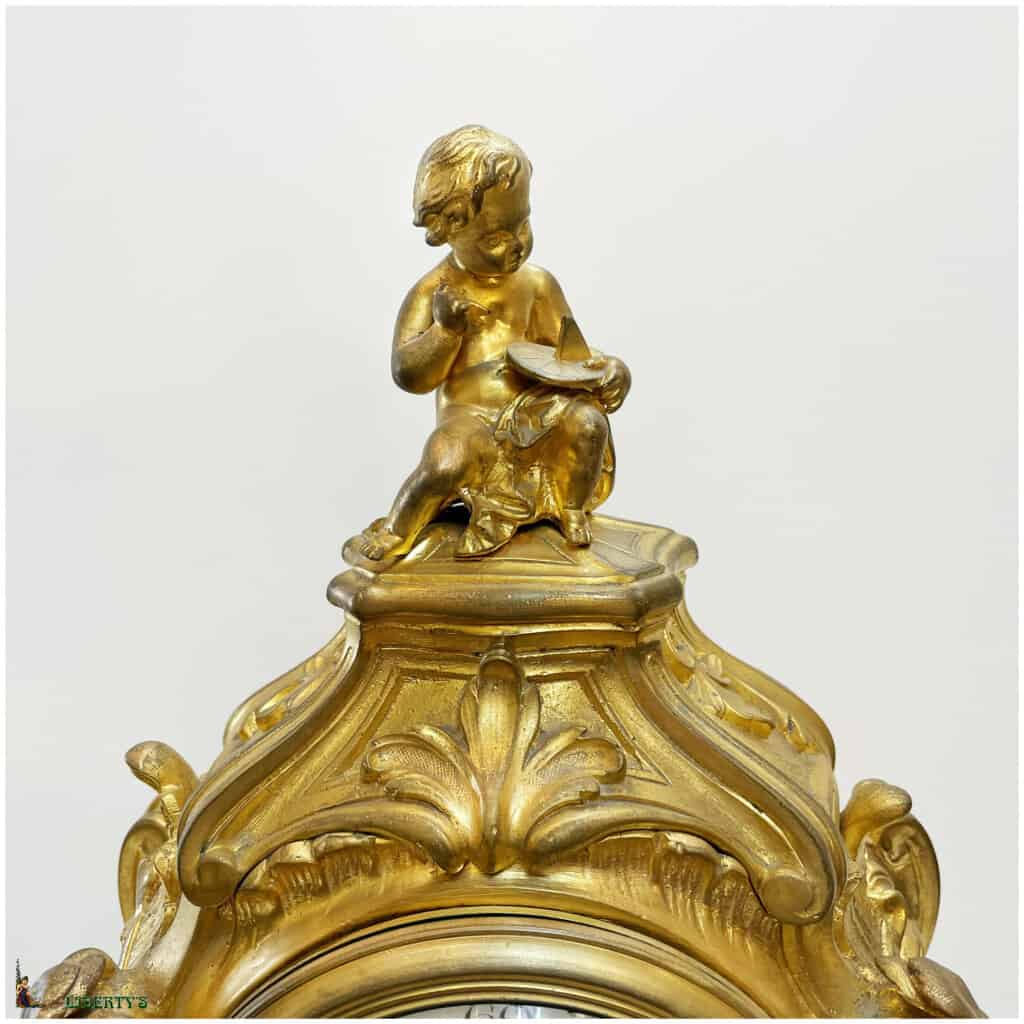 Pendule rocaille en bronze doré au mercure avec enfant savant, haut. 42 cm, (Mi XIXe) 4