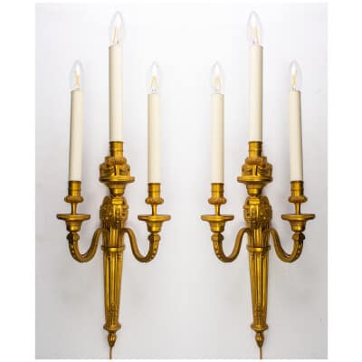 Pair of bronze sconces with rams XIXnd