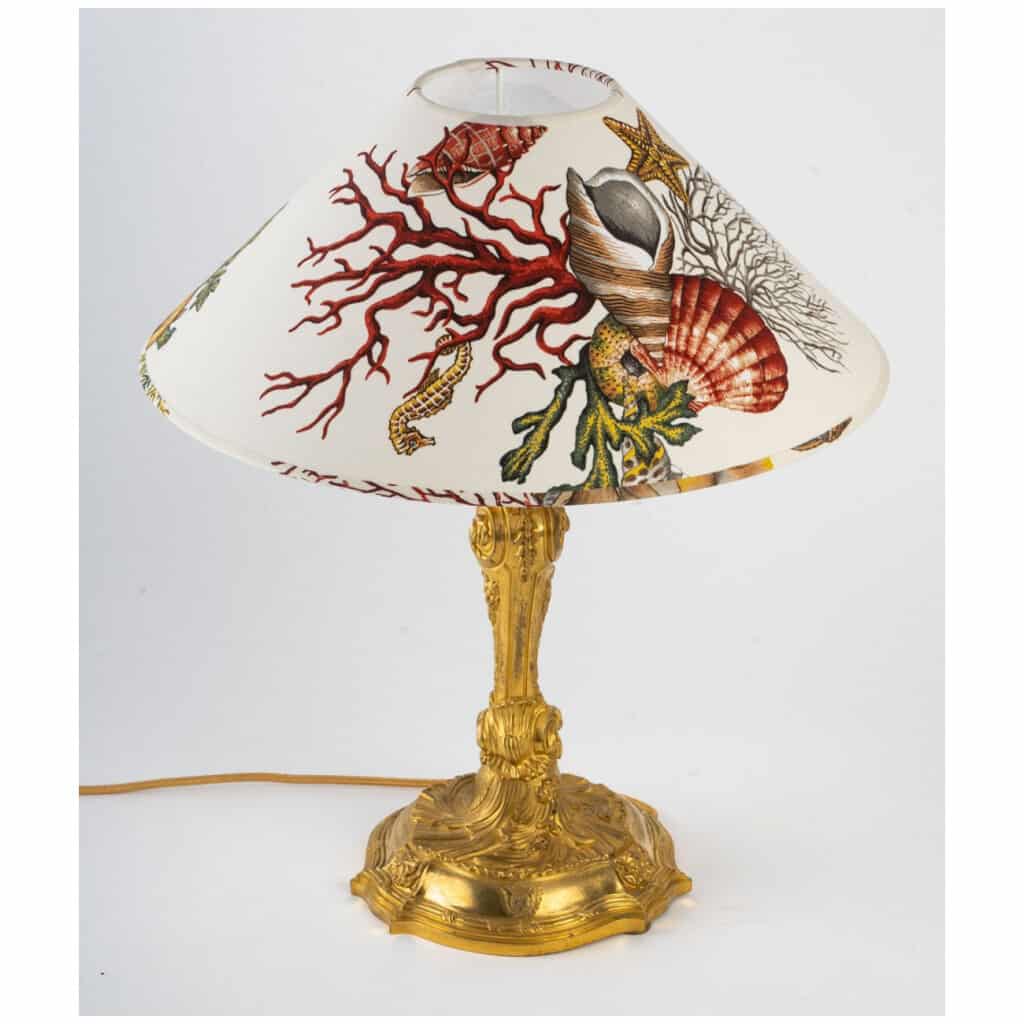 Armorial gilt bronze lamp. 7