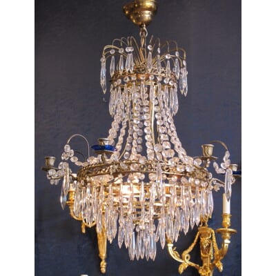Chandelier with six sconces.