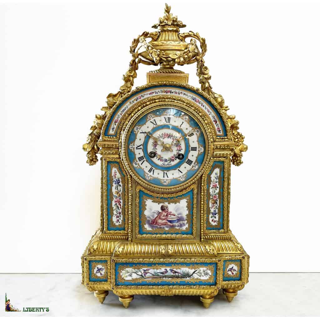 Mercury gilt bronze clock with 12 Sèvres porcelain plates, openwork hands, silk thread suspension, signed Robin à Paris, Haut. 47 cm, Mid. XIXe 3