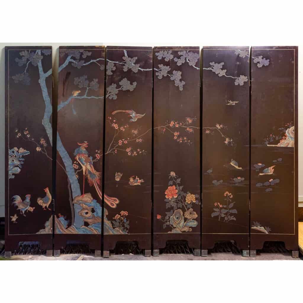 Screen in Coromandel lacquer. Second half of XIXth. 7