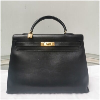 Hermès, Kelly model handbag, in black leather, 3st century