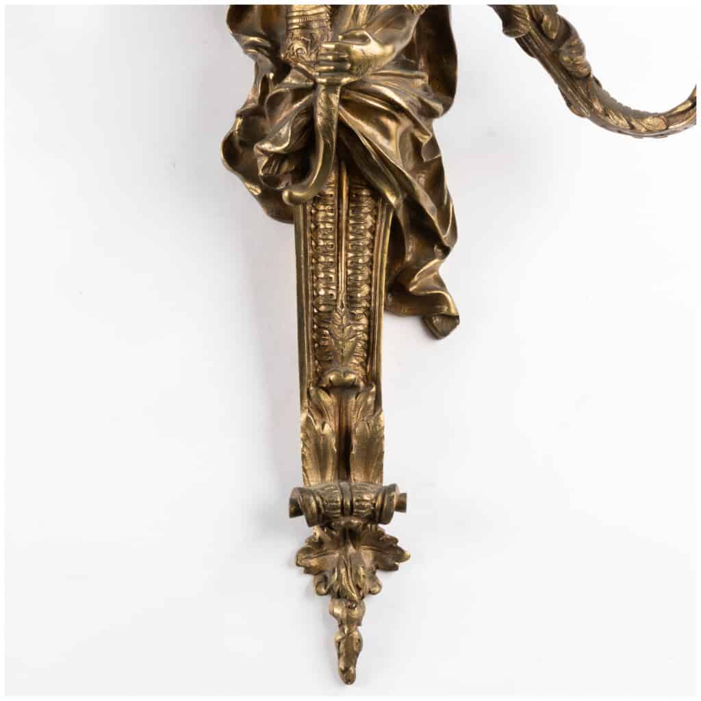 Pair of gilt bronze soldier sconces, XIXand 14