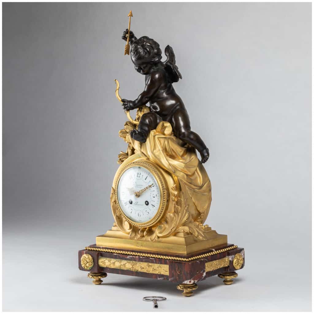 Guillaume Denière (1815-1901), Cupid clock in bronze with brown patina and gilt bronze, 4th century XNUMX