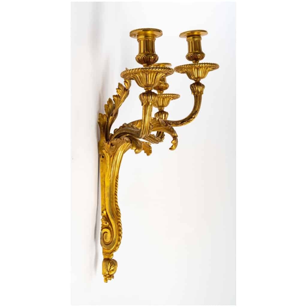 Series of four Transition style sconces in gilded bronze. XIX th century. 5