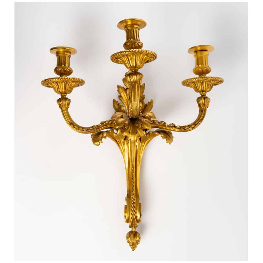 Série de quatre appliques de style Transition en bronze doré. XIX ème siècle. 4