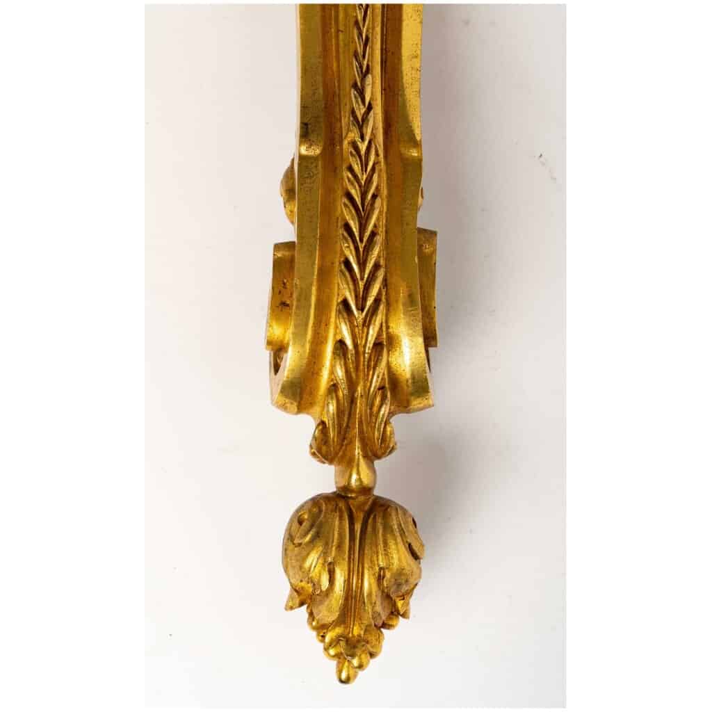 Series of four Transition style sconces in gilded bronze. XIX th century. 10