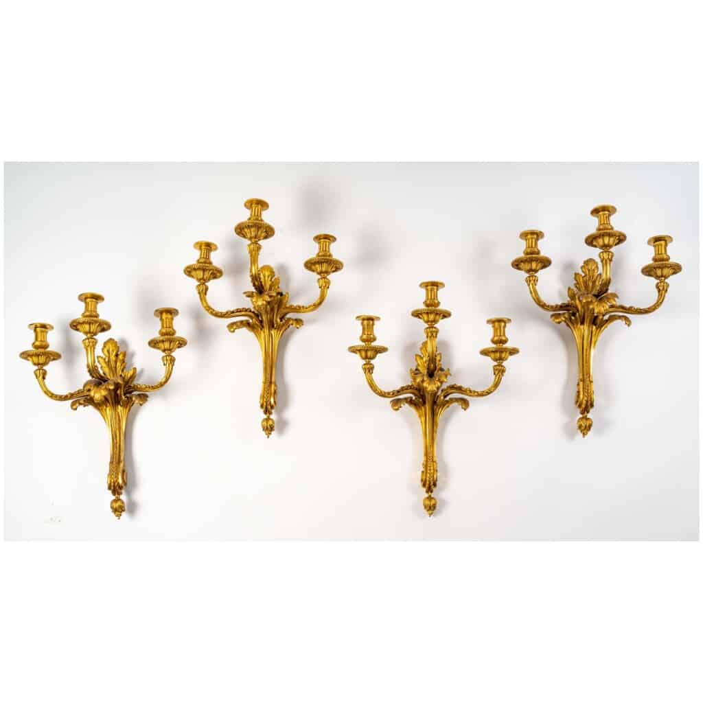 Series of four Transition style sconces in gilded bronze. XIX th century. 3