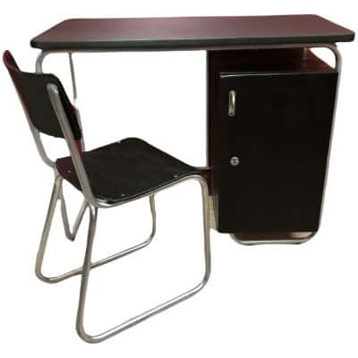 BAUHAUS style desk in painted wood and tubular metal legs, top covered with black imitation leather