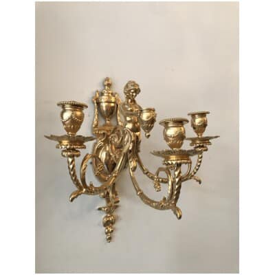 Pair of three-armed gilt bronze sconces, Louis style XVI