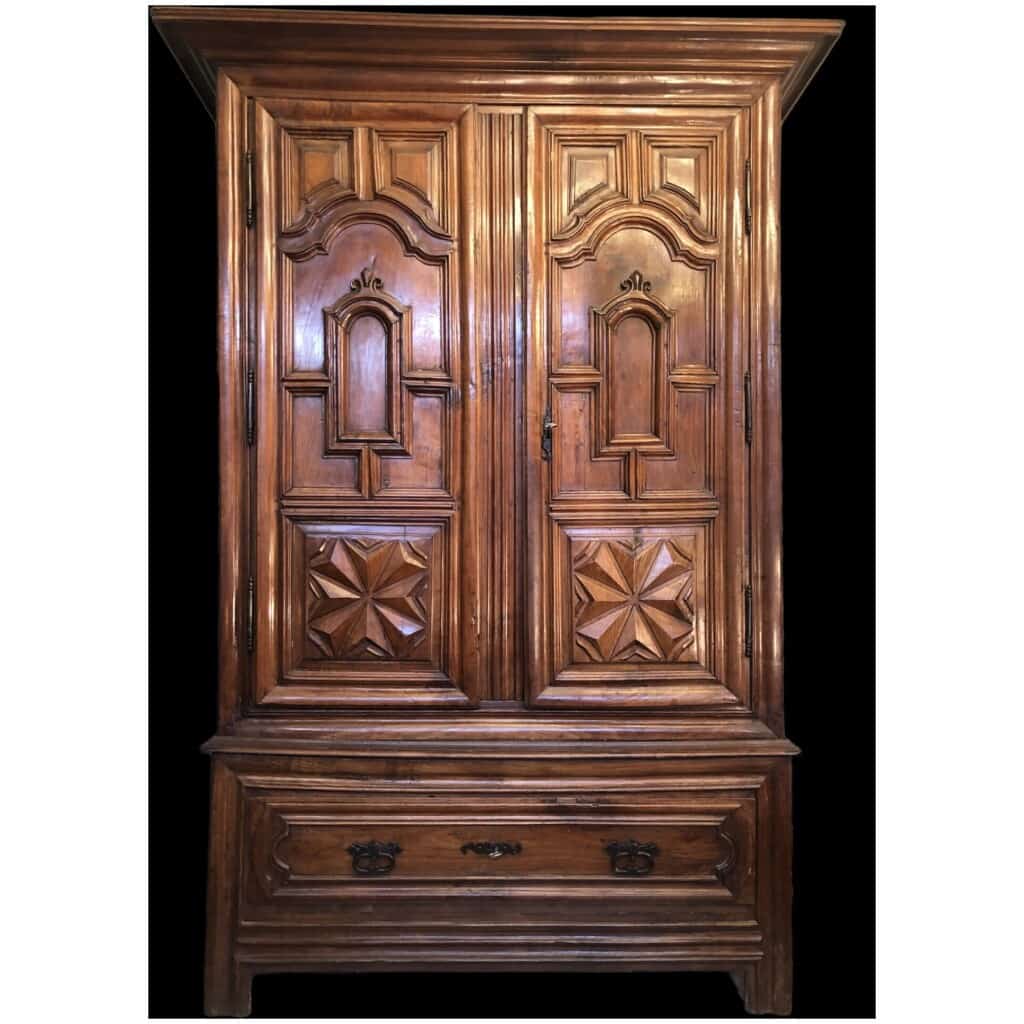 17th century cherry wood trouser cabinet opening with two doors and a large drawer. Work from the South West of France. 9