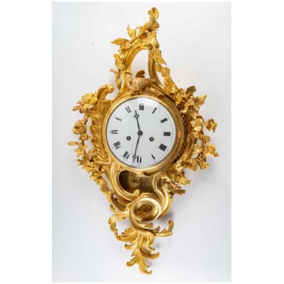 Wall clock in chased and gilded bronze, Louis XV period from the Chamber of Bailiffs at the Royal Palace