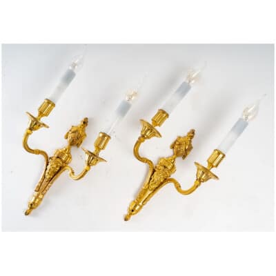 Pair of chiseled and gilded bronze sconces called aux Béliers in the Louis style XVI to 1820
