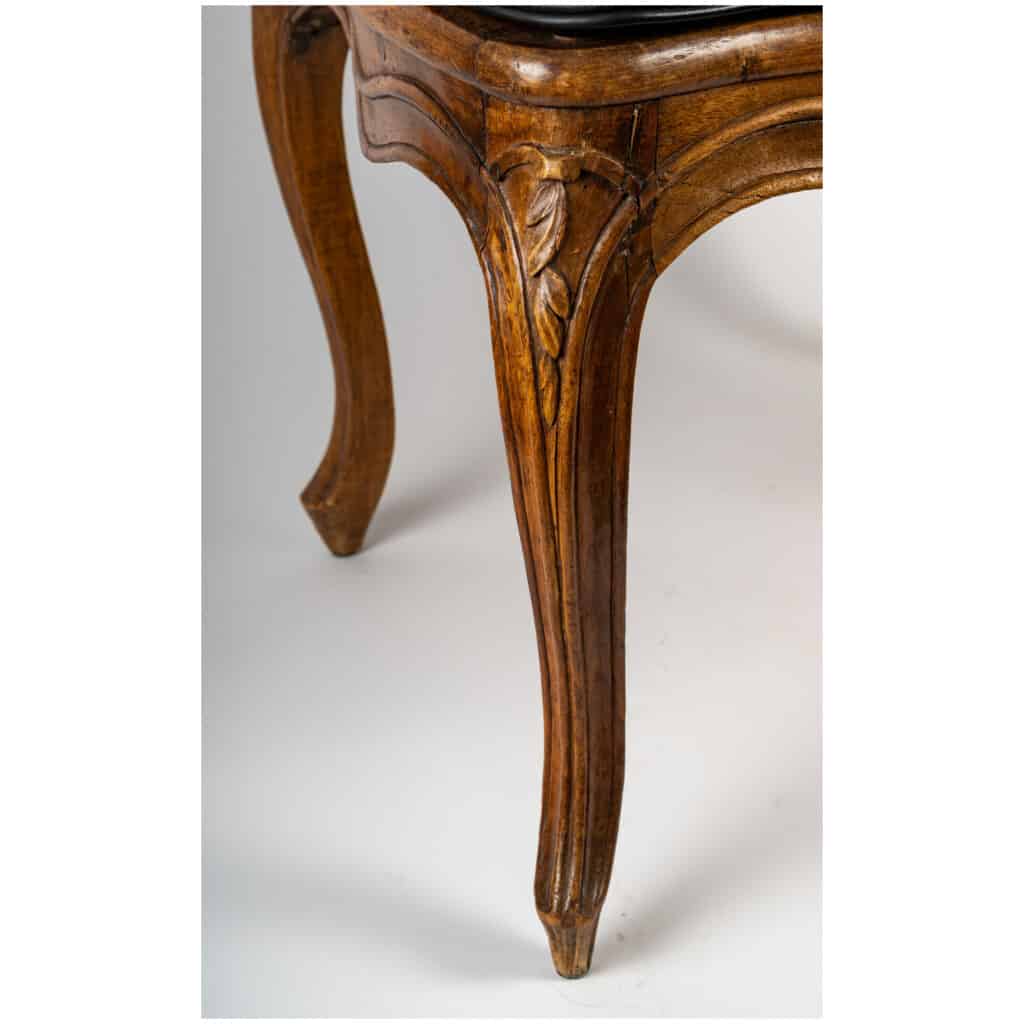 François Canot – Fauteuil à fond de cannes en bois naturel mouluré et sculpté d’époque Louis XV 6