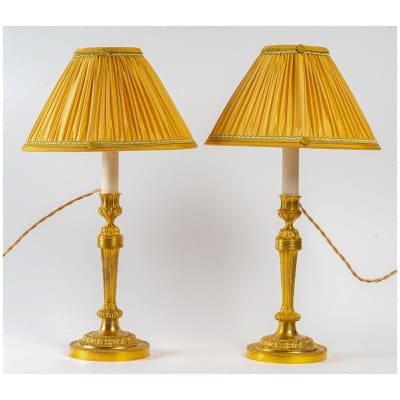 Pair of chiseled and gilded bronze candlesticks mounted as lamps late Louis period XVI