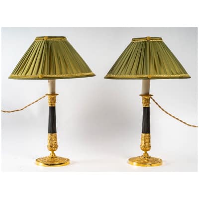 Paire de flambeaux montés en lampes en bronze doré à décor du Dieu Mercure époque Empire vers 1805-1810