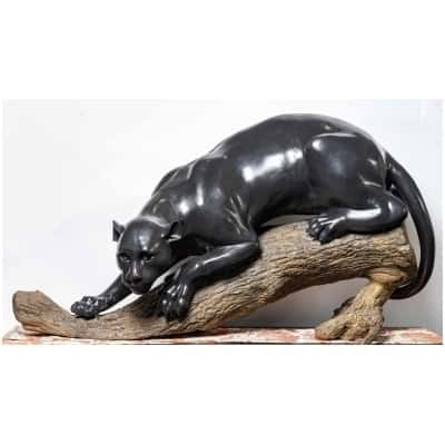Important bronze group of a black panther on a branch