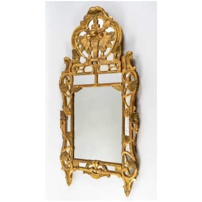 Large glazing beads mirror from the Louis XV period (1724 - 1774).