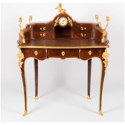 Bureau de Dame à l’horloge en marqueterie de bois précieux et en bronze doré, XIXe