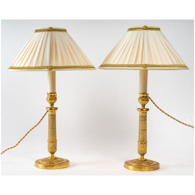 Epoque Empire Paire de flambeaux en bronze ciselé et doré montés en lampes
