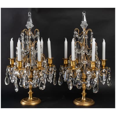 Paire de girandoles de style Louis XVI en bronze doré et décor de cristal vers 1850-1870