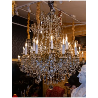 Chandelier with 12 sconces in gilded bronze and cut crystal by Baccarat circa 1850-1860