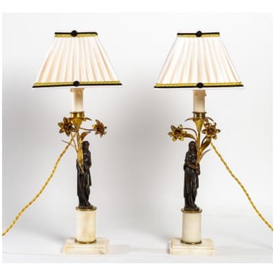 Pair of candlesticks in marble and chiseled bronze decorated with Woman in the Antique Directoire period