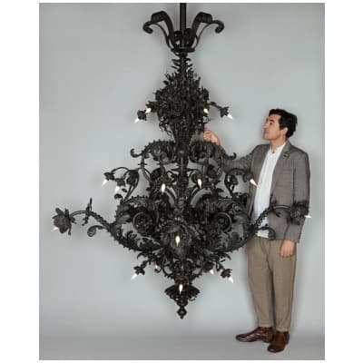 Large wrought iron chandelier from the end of the 19th or beginning of the 20th century. SOLD.