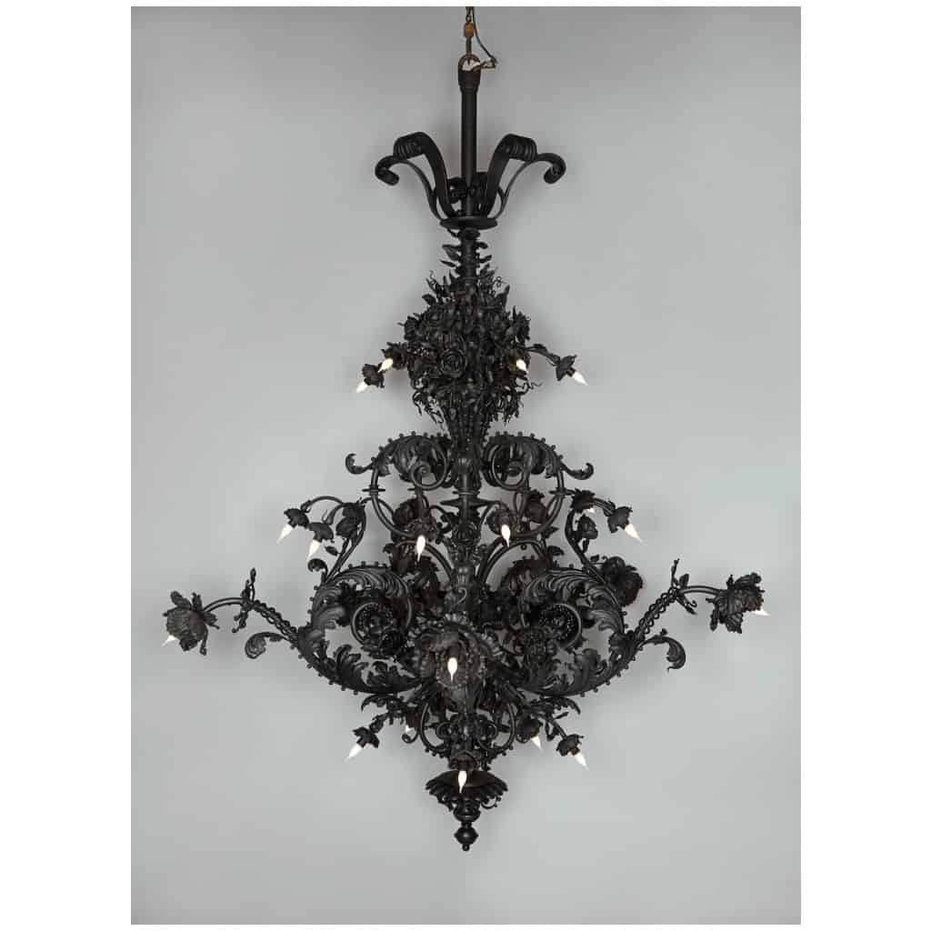 Large wrought iron chandelier from the end of the 19th or beginning of the 20th century. SOLD. 12