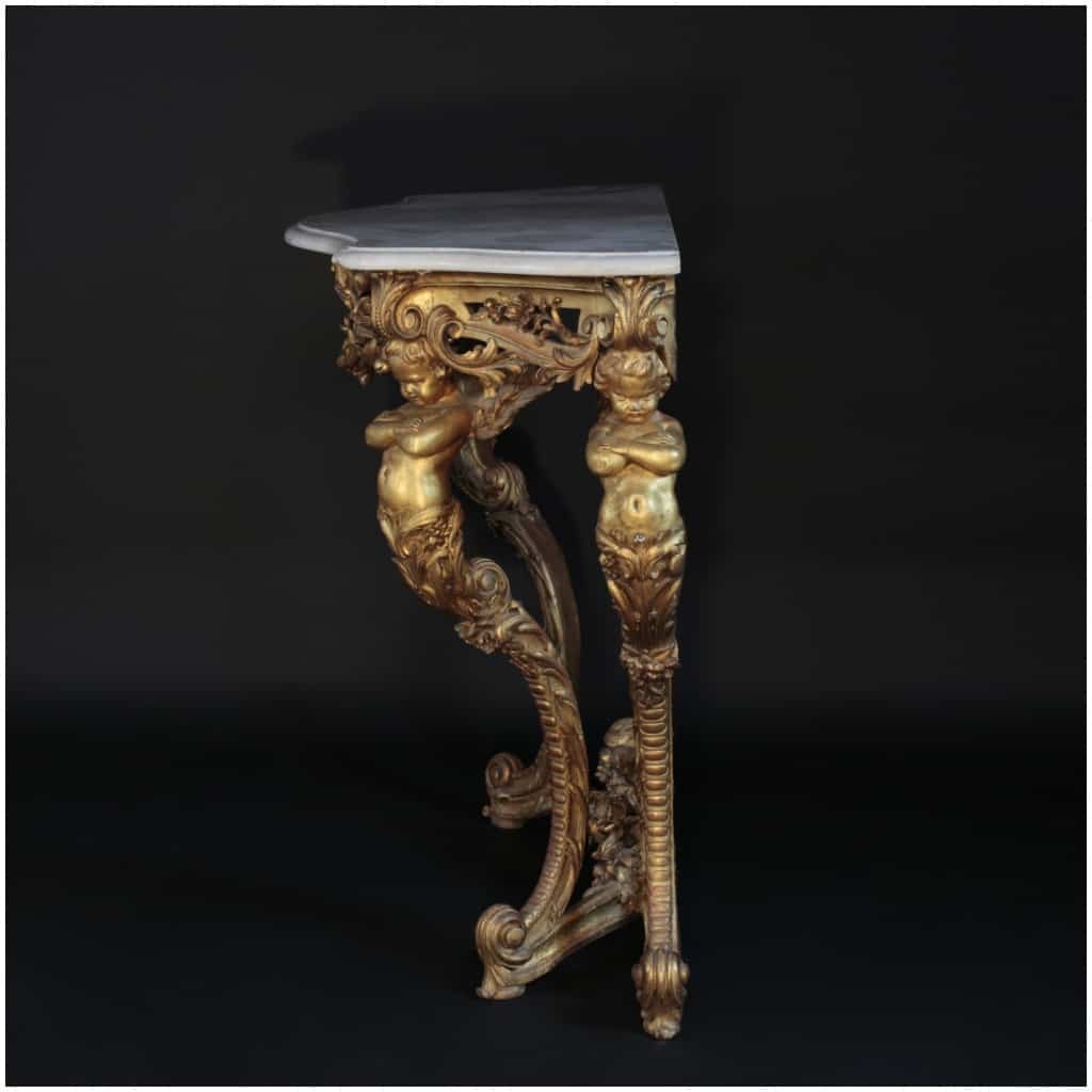 Console aux Putti en chêne sculpté et doré, plateau en marbre de carrare, XIXe 5