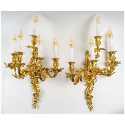 Important pair of Louis XV style five-light sconces in chased and gilded bronze circa 1850