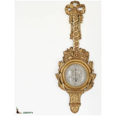 Carved wooden wall barometer gilded with gold leaf, top. 95 cm, (mid. XNUMXth century)