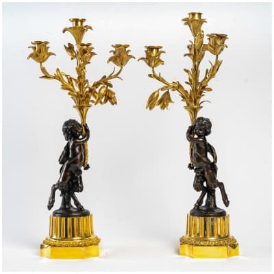 Paire de candélabres de style Louis XVI en bronze à décor de Faunes vers 1860-1880