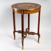 Inlaid pedestal table. 8