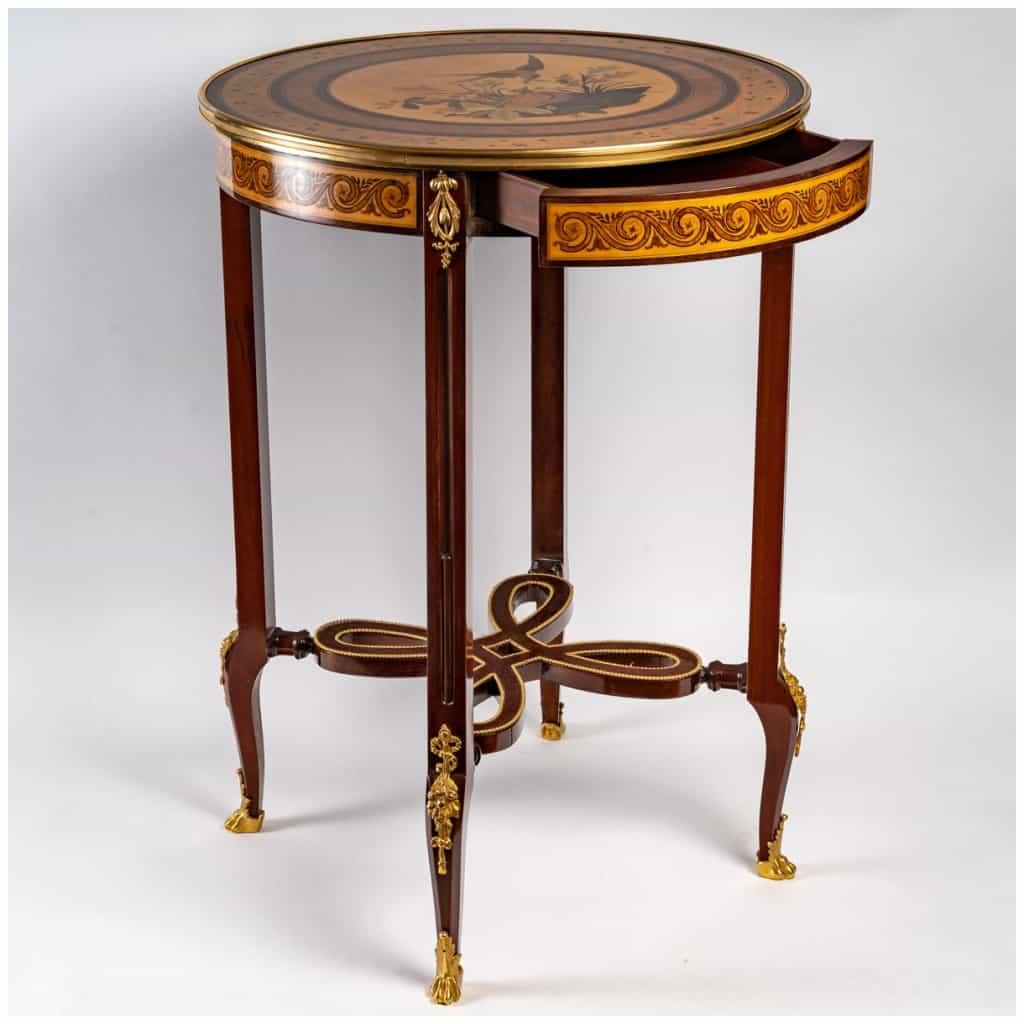 Inlaid pedestal table. 7