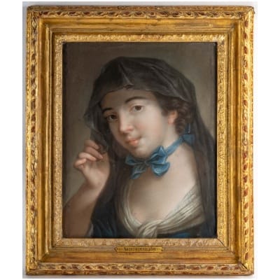Portrait of a young woman with a blue ribbon.