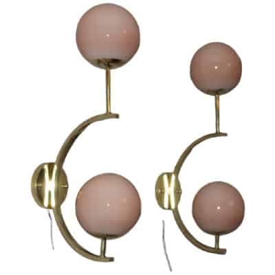 Pair of Italian sconces with salmon beige globes in glass and brass