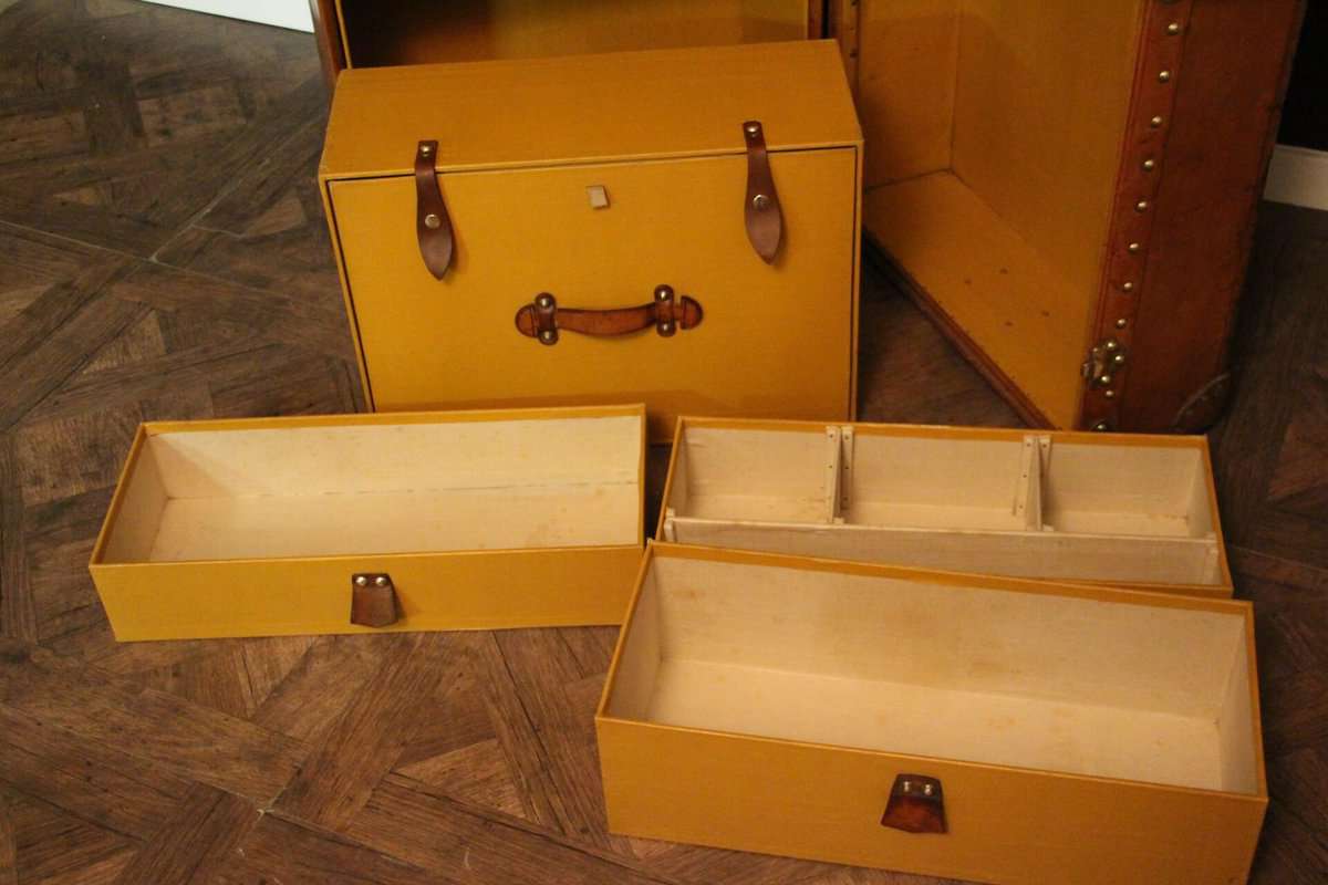 Louis Vuitton leather wardrobe trunk - Les Puces de Paris Saint-Ouen