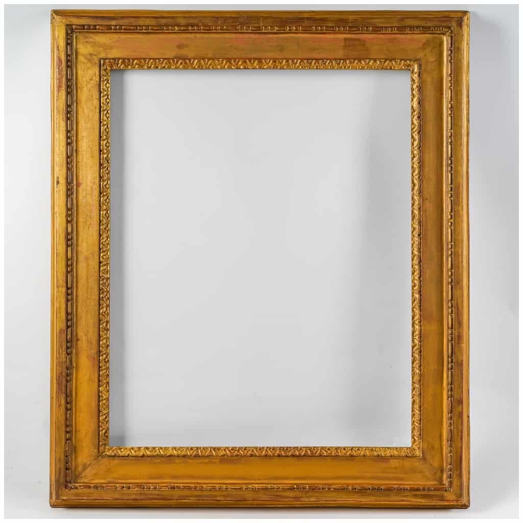 Carved and gilded wooden frame from the Louis period XVI 3