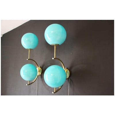 Pair of mid century modern Italian sconces in brass and turquoise blue glass