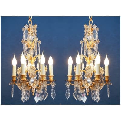 Paire de lustres de style Louis XV.