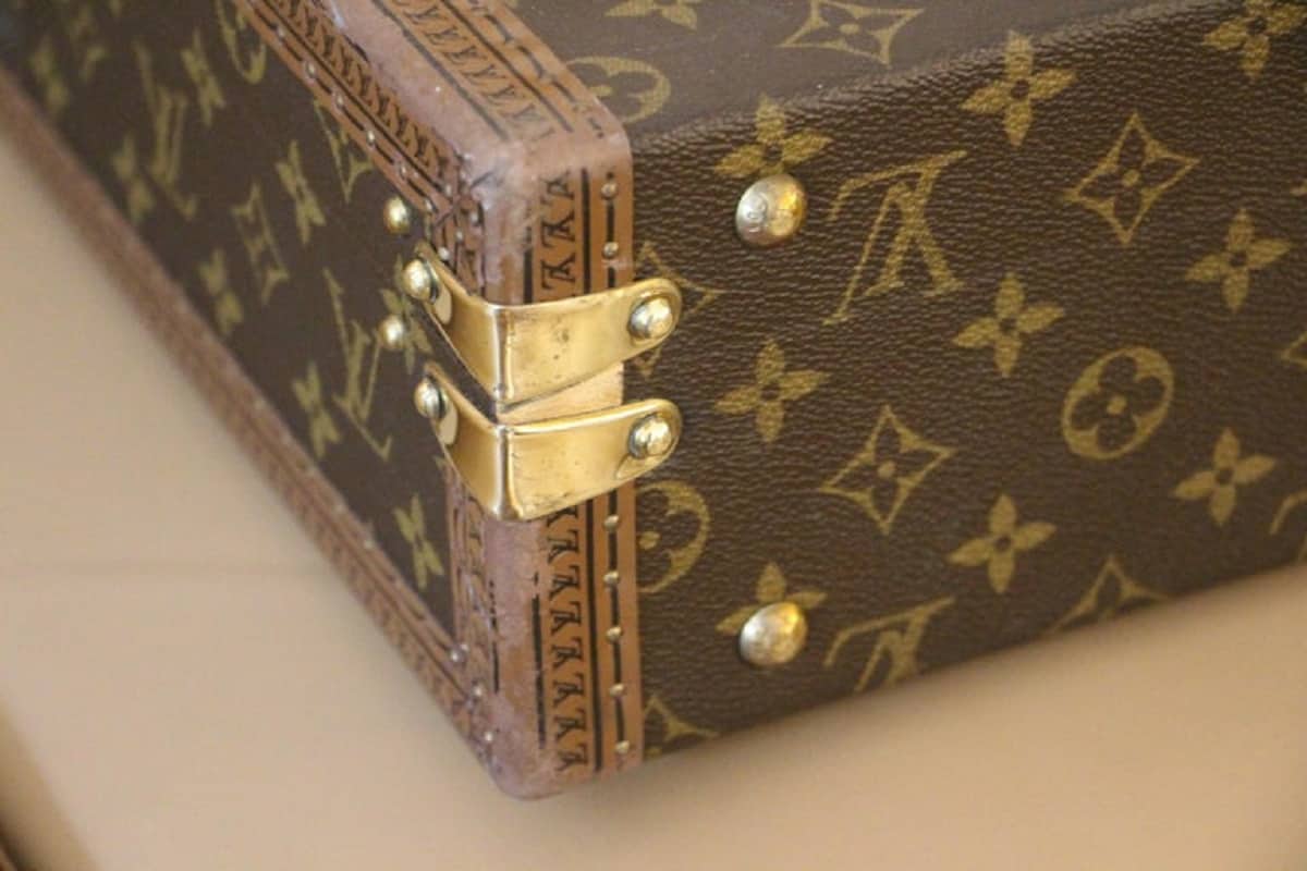 Vintage watch case with monogram pattern by Louis Vuitton, France