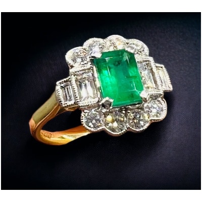 18 Carat Yellow Gold Emerald And Diamond Engagement Ring