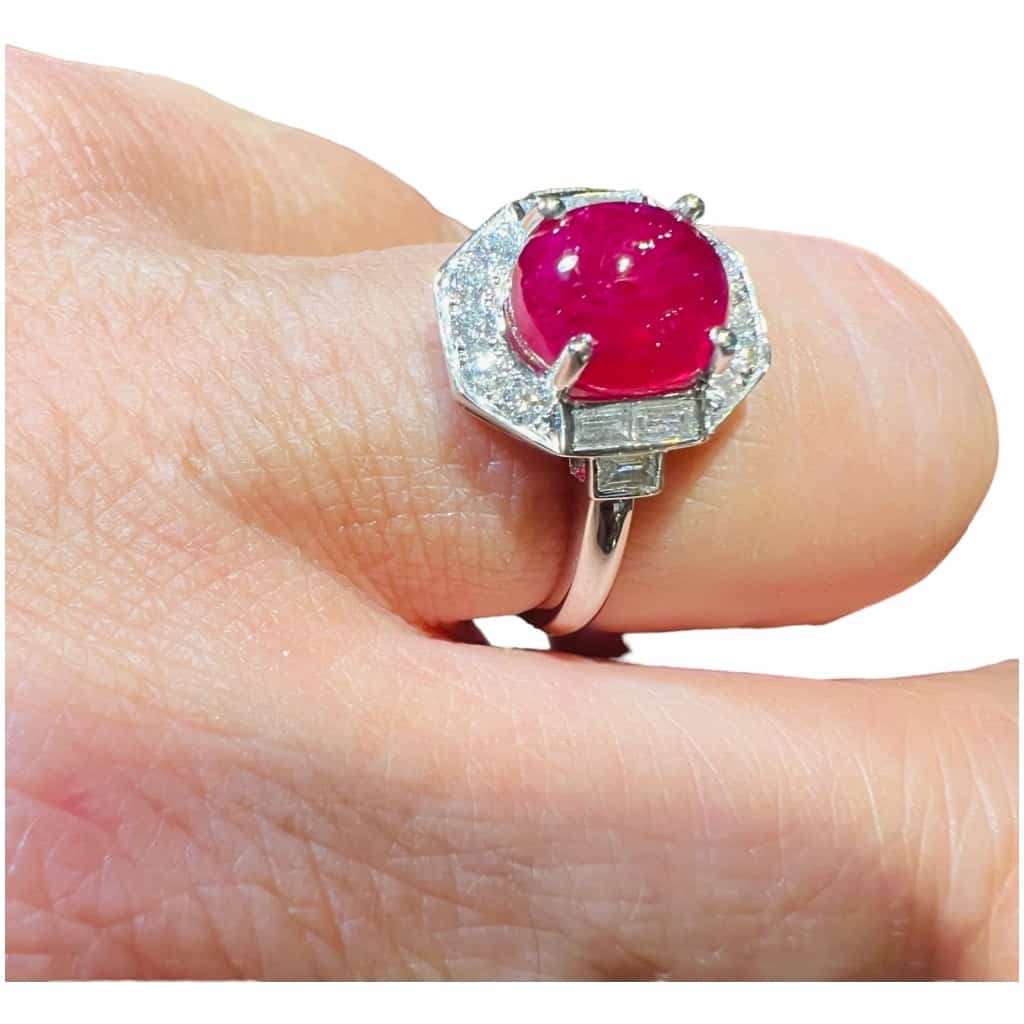 18 Carat Gold Ring Set With A Ruby Cabochon Surrounded By Diamonds 8